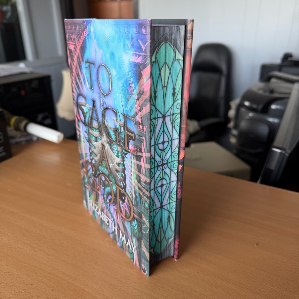 To Cage A God Hardcover Book with Sprayed Edges
